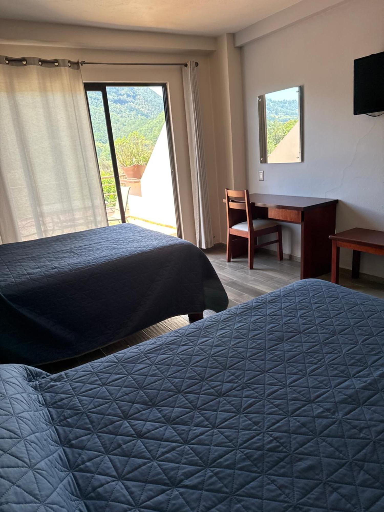 Tlatlauquitepec Hotel Suites Don Miguel מראה חיצוני תמונה